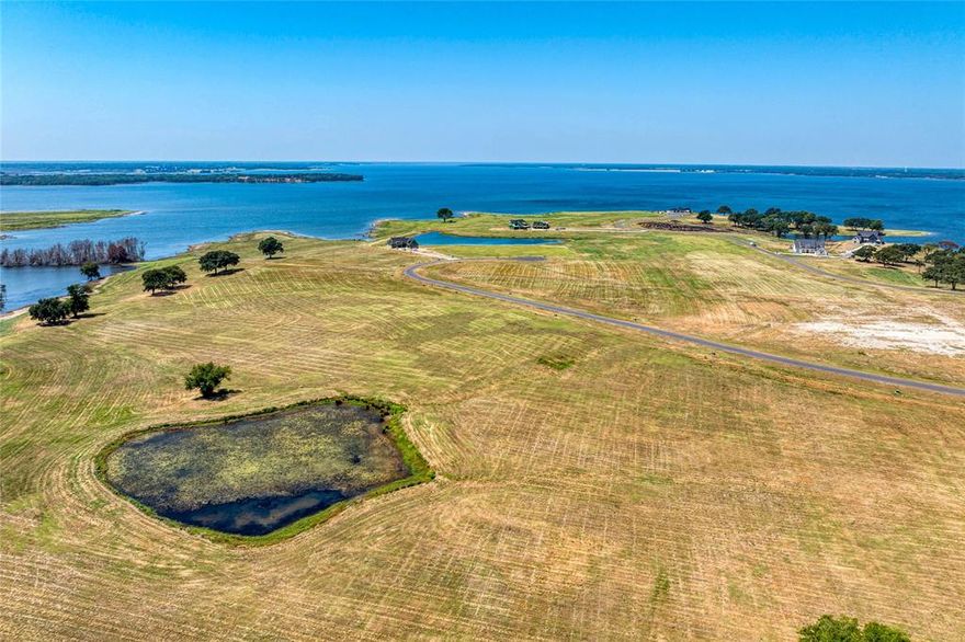 EXTREMELY MOTIVATED SELLER - BRING YOUR BUYERS & MAKE AN OFFER TODAY.

Don't miss this incredible opportunity to own a 2.28-acre lakefront lot at 245 Sailview Ct, Honey Grove, TX, in The Peninsula, the first premier community on Bois d’Arc Lake. With breathtaking 180-degree lake views and a private pond, this lot is perfect for building your dream home and creating lasting memories.  

Priced under $240K, this property offers luxury living in a gated lakeside community. Enjoy stunning sunsets, a multi-million-dollar clubhouse with an infinity pool, grilling stations, a putt-putt course, and a resident lounge with a kitchen and bar. Coming this year, even more amenities await, including community marinas with homeowner boat slips, a fenced dog park, a playground, a multipurpose field, and a kayak - paddleboard launch.  

Build your legacy in a bring your own builder community and experience the ultimate lakeside lifestyle. The South 1396 Boat Ramp is under 20 minutes away for easy lake access, making this a dream location for lake lovers.  

This seller is ready to make a deal lets negotiate.

*Buyer to verify all information*