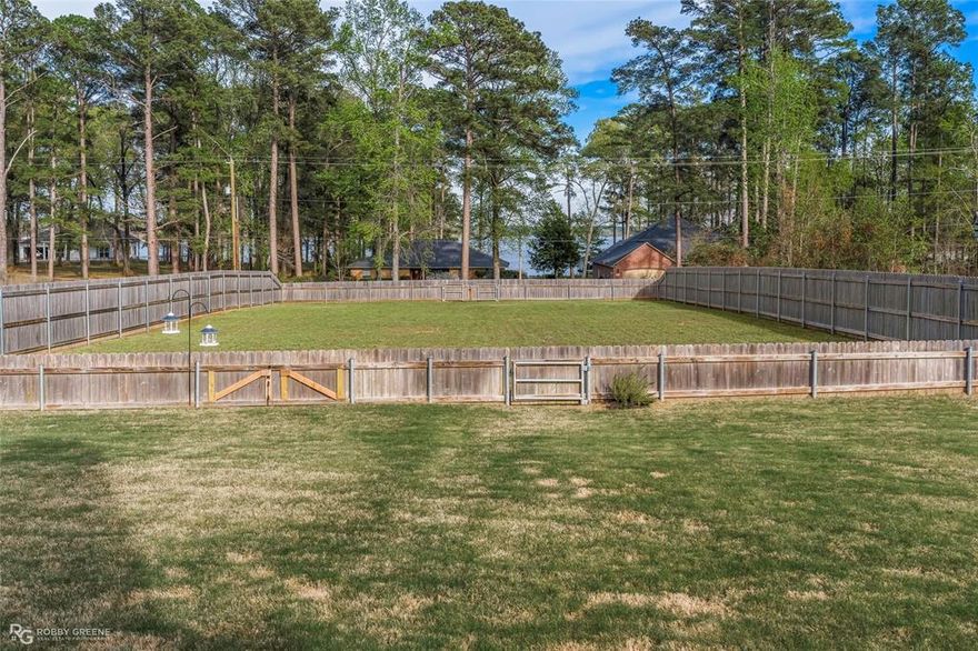 Build your dream home on this beautiful residential lot in the desirable Turtle Creek Subdivision in Benton!  This cleared and well-maintained property offers a wonderful view of Cypress Lake.  The lot is fully fenced providing flexibility for a variety of uses.  This property can be purchased separately or with the home located directly behind at 63 Turtle Creek Drive (See MLS #21212792 for additional details).  Whether you're ready to build now or planning for the future, this lot has alot to offer.  Utilities are all available.  Lot measures 70' x 155' x 70' x 154'.