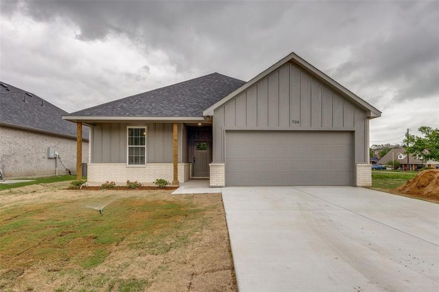 Welcome home! This is a brand new construction home located in the heart of Wolfe City with easy access to Hwy 34! This beautiful new home offers an open floor plan that includes 4 bedrooms, 2 full bathrooms, walk in pantry, full size laundry room, walk in closets and so much more. The stunning kitchen features quartz countertops, stainless steel appliances and black fixtures. Flooring includes luxury vinyl plank, ceramic tile and carpet. The master bathroom features a double vanity, a walk in shower and large walk in closet. The backyard includes a covered patio and a stained privacy fence This home is USDA qualified and can be purchased with no money down! 

Listing agent is owner of home. Buyer and buyers agent to verify all information.