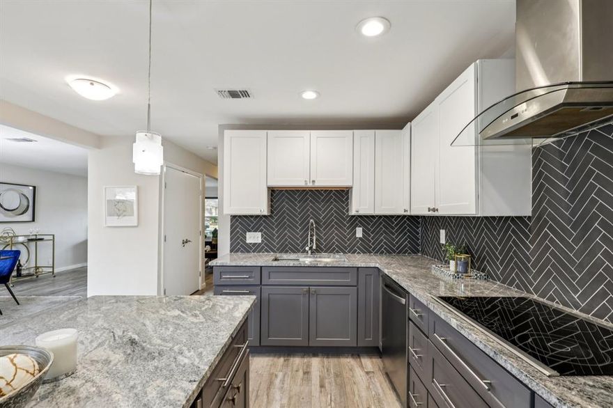 OPEN HOUSE TODAY: Sunday 12noon - 2:00pm.  The fully remodeled kitchen serves as the centerpiece of the home, featuring an oversized island, updated cabinetry, countertops, and stainless-steel appliances—perfect for both everyday living and entertaining. Largest floorplans in the community with major systems already replaced, this home offers a rare combination of space, updates, and long-term value in North Dallas

From the moment you step inside, the open-concept layout connects the living and dining areas, creating an easy flow for daily living and gatherings. For buyers comparing size, updates, and long-term value, this home clearly stands out within the community.

What truly sets this home apart is the work that has already been done for you. Major system updates—including HVAC, water heater, electrical panel, and plumbing improvements—help reduce the risk of unexpected repair costs for the next owner, providing added peace of mind from day one.

Upstairs, the spacious primary suite offers great natural light, dual sinks, a walk-in closet, and a comfortable retreat. Two additional bedrooms provide flexibility for guests, a home office, or additional living space.

Step outside to a private patio ideal for relaxing or entertaining. Enjoy a low-maintenance lifestyle with exterior upkeep handled, allowing more time to focus on what matters most, along with access to community amenities.

Property may be eligible for down payment assistance programs—buyers must qualify and should consult with their lender for eligibility and program details.