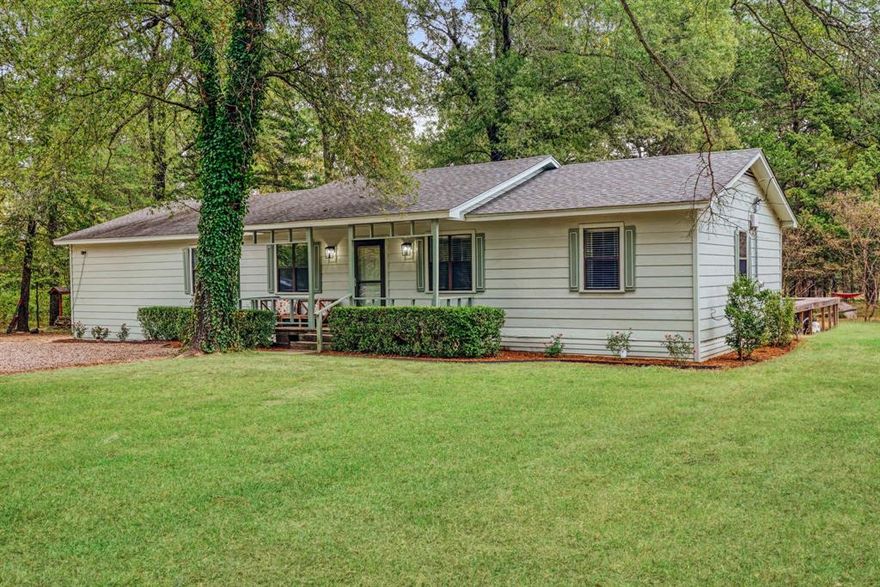 Adorable and updated 3-bedroom, 2-bath home with an office on 12.319 wooded acres near the Paris Golf & Country Club. Features fresh paint,  updated appliances, and many new modern touches throughout. Enjoy a spacious deck, pool, and large outdoor entertaining area — perfect for relaxing or hosting guests in a beautiful, private setting.