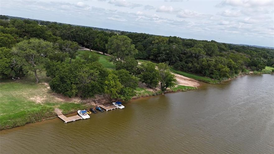 Prime opportunity in Horseshoe Bend, TX Across 5 Lots! Welcome to your future homesite in the scenic Horseshoe Bend community! This spacious 0.41 +or -acre property consists of five combined lots, offering plenty of room to build your dream home or place a mobile home all while enjoying the peaceful surroundings of this charming area. Key Features: Mobile Homes Welcome Flexibility to create the perfect living space. Utilities Available Horseshoe Bend water and electricity are conveniently located at the street. Seller Financing Available Minimum 35% down payment required. Horseshoe Bend Amenities: Float the Brazos River. Enjoy relaxing days on the water, perfect for tubing, kayaking, and fishing. Golf Course Access Tee off at the local golf course, offering scenic views and a great community atmosphere. Wildlife & Nature Horseshoe Bend is known for its natural beauty, with opportunities for birdwatching and peaceful outdoor living Boating & Fishing The nearby river and lakes provide excellent spots for boating and fishing enthusiasts. This property offers the perfect blend of tranquility and convenience, making it an ideal investment or future homesite. Don’t miss out on this fantastic opportunity, reach out today for more detail