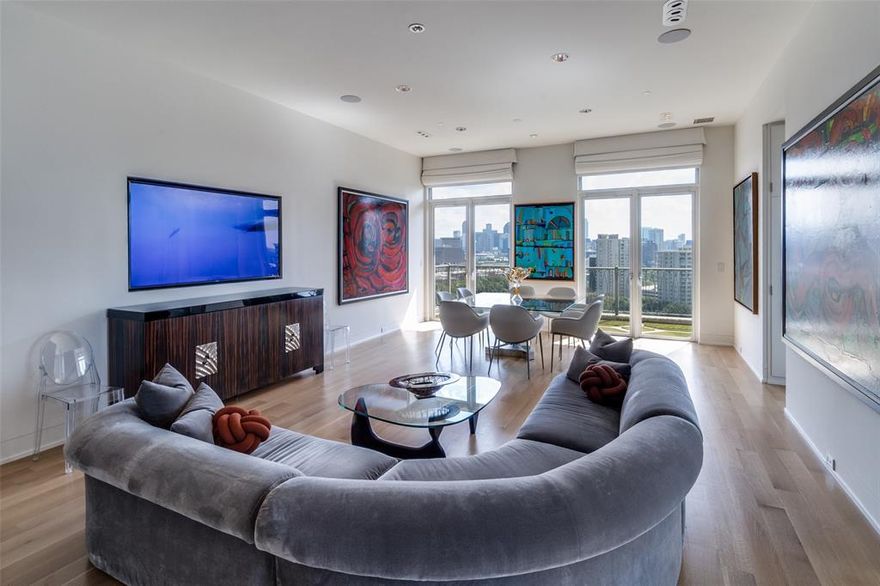 Splendid site lines lead to picturesque downtown skyline in this sensational condominium atop the Vendome on Turtle Creek. Park Cities Contractor remodeled this fashionable space with attention to every detail. The unit boasts a re-configured kitchen appointed with Miele appliances and Sub -0- refrigerator-freezer. Book matched marble surfaces walls and counters. The primary features a wide reading nook hallway, two walk in closets, sumptuous bath with tub and shower and expansive counter surface, and the signature 'box window' of the E unit, surveying the NW skyline. The ancillary bedroom, secured by pocket doors duals as a library. It is accompanied by an ensuite bath. Museum wall finishes compliment the architecturally designed wall panels. Panels conceal an extensive amount of storage space. A dramatic powder room flanks the foyer upon entrance.  residents of the Vendome enjoy five-star amenities, including the 24-hour valet and concierge, a resort style pool with cabanas and gazebo, a fitness center, elegant community rooms and an uncompromising security. 17 E enjoys 2 parking spaces, conveniently situated off the elevator and a storage locker.