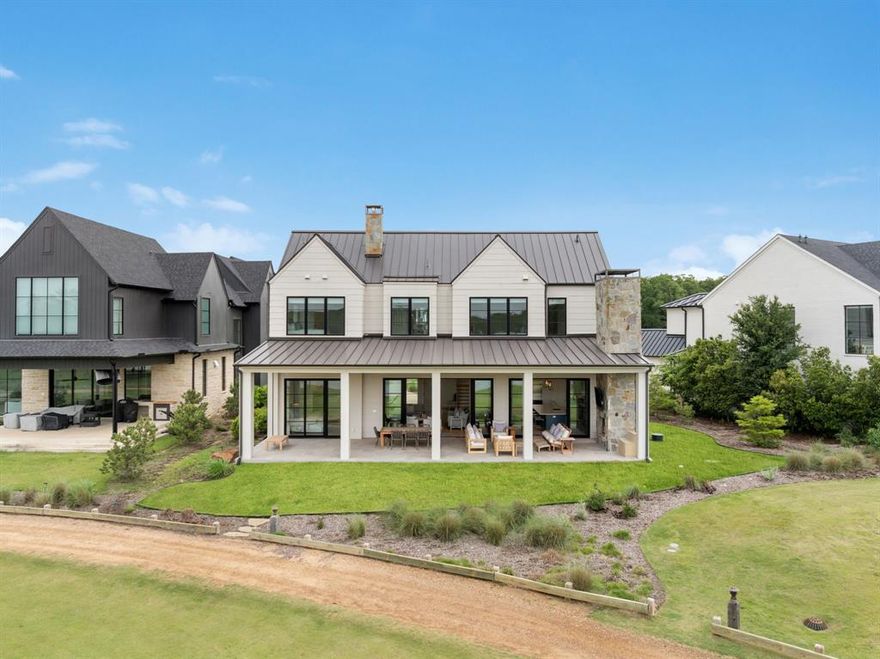 Set along the shoreline of Henderson Bay, this thoughtfully designed Modern Farmhouse offers elevated
lakefront living with room for the whole family. Featuring 5 spacious bedrooms—all with master-sized baths—2
custom bunk rooms, and a large upstairs living area, it’s built for memory-making weekends. Nearly 1,000
SQ. FT of covered outdoor living space provides front-row seats to sunset views and amphitheater concerts.
Built by Greenwell Homes and designed by John Boyd, this home is a standout in craftsmanship, comfort, and style.