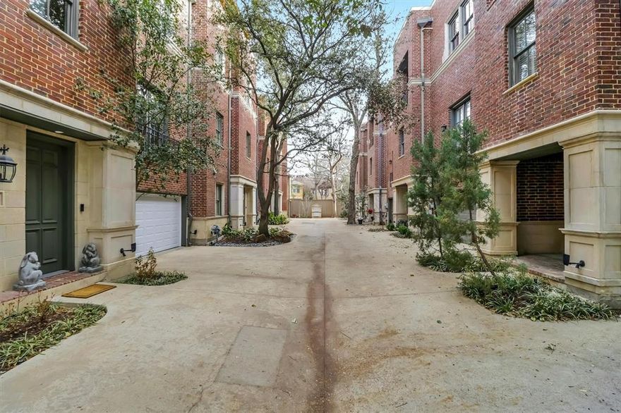 Back on market due to buyer’s change of mind; property condition was not a factor. Stunning 3 story townhome with views of downtown Dallas & a low HOA! This beautifully maintained residence offers a versatile layout with quality finishes throughout. The 1st floor features 2 spacious bedrooms with rich wood floors and a full bath with elegant travertine flooring & walkin shower...perfect for guests, roommates, or a private retreat. On the 2nd level, enjoy an open-concept living space designed for both comfort and entertaining. The living room showcases a cozy fireplace, built-in cabinetry, and a stylish dry bar. The dining area is highlighted by decorative lighting, while the kitchen impresses with granite countertops, stainless steel appliances, white cabinetry, and abundant natural light. Plantation shutters add charm and privacy. This level also includes a dedicated office space, a convenient half bath, and access to a covered balcony for relaxing outdoors. The 3rd floor primary suite is a true sanctuary, complete with two walk-in closets and a luxurious bath featuring travertine flooring, granite countertops with dual sinks, a walk-in open shower, and a standalone soaking tub. Additional highlights include dual staircases, a rooftop patio with a turfed area, and breathtaking views of downtown Dallas. The exterior combines timeless stucco accents with brick for striking curb appeal. A small gravel dog run adds extra convenience for pet lovers. This exceptional townhome blends style, functionality, and location—don’t miss your opportunity to own a sophisticated urban retreat!