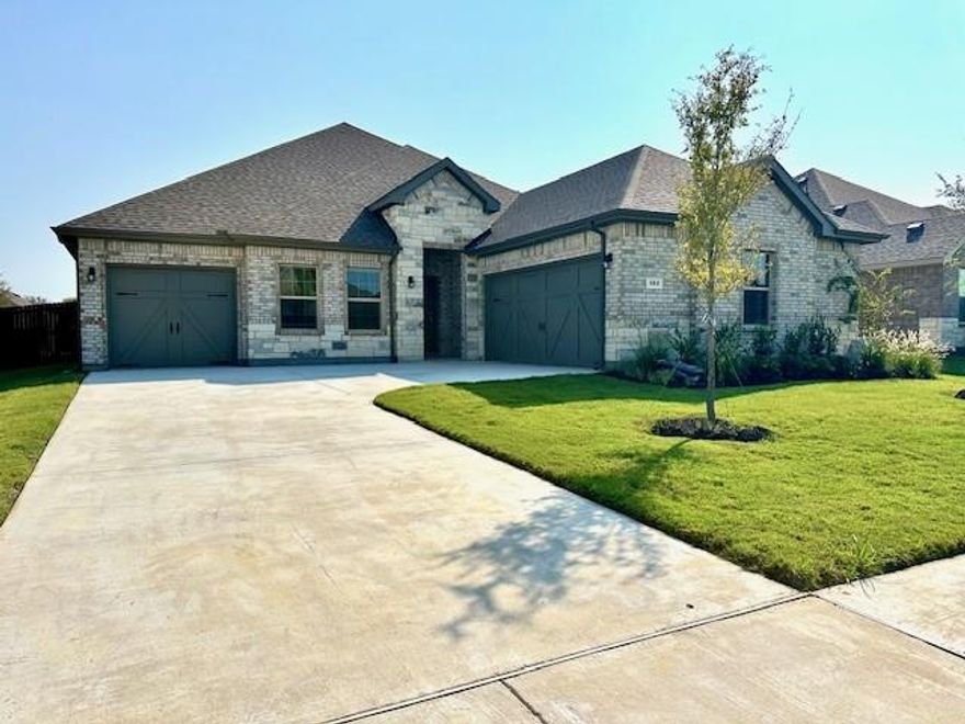 Beautiful newly completed home with a wonderful open layout. Kitchen has a large seating island facing the living and dining room. Spacious bedrooms and closets, large laundry room with washer and dryer included, covered back patio and did we mention a 3-car garage. Great home in Mansfield ISD and near plenty of shopping and dining. Deposit is only half of the monthly rent amount, take advantage and move-in quickly!
