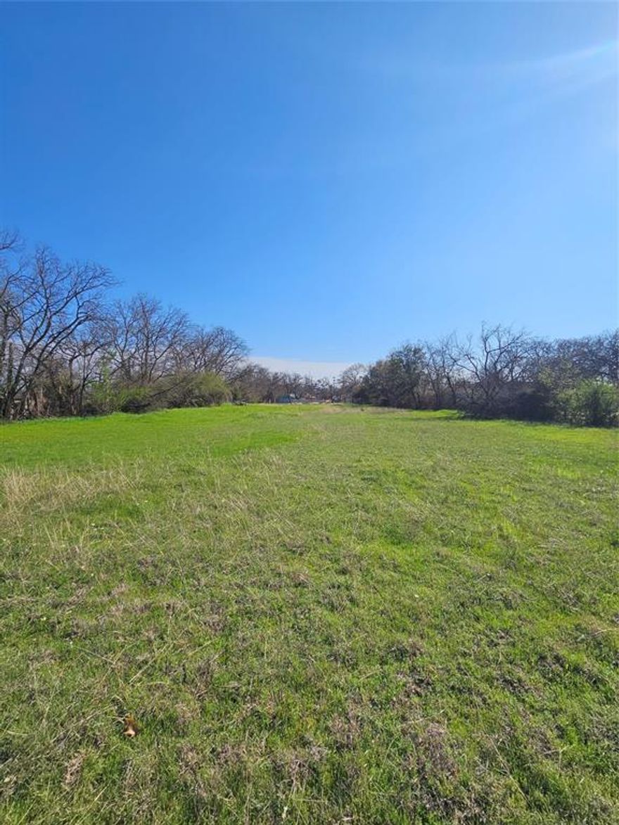 Commercial lot positioned near the corner of Highway 180 and E Loop 820 in Fort Worth. The Texas Department of Transportation is currently constructing a new bridge on Craig Street to cross Loop 820, which will place this property as one of the first commercial lots along the access road at the corner of Craig Street and the new bridge connection.

A previous structure of approximately 1,926 square feet once occupied the site, and the existing concrete slab remains in place. Water and electric utilities are already available on the property, and the lot is fully fenced, providing a practical foundation for future development.

With proximity to major traffic corridors and ongoing infrastructure improvements in the immediate area, the property offers a well-positioned site for a variety of commercial possibilities.