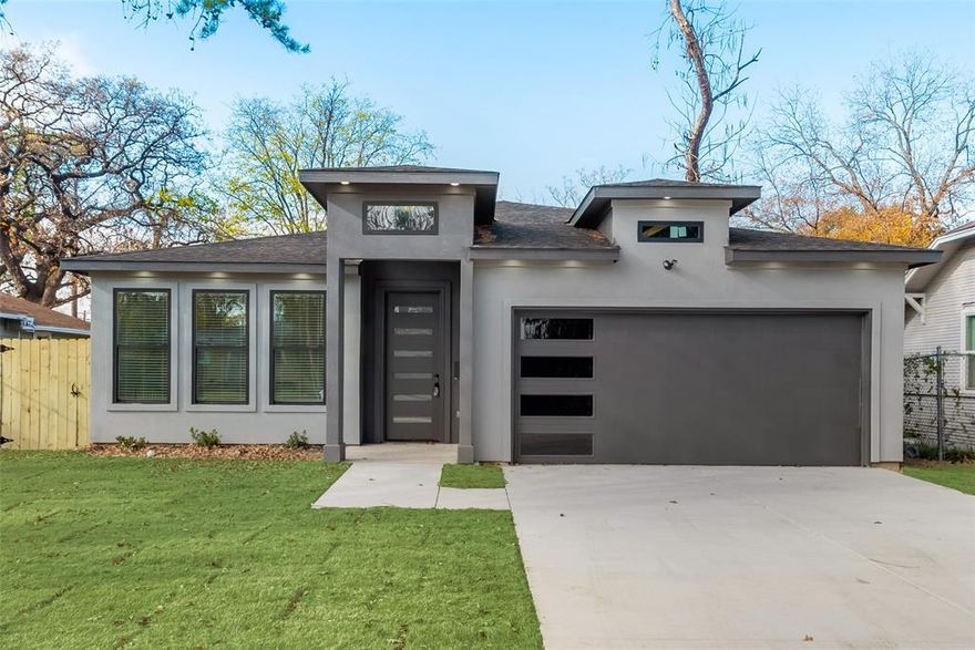 *WELCOME TO YOUR BRAND-NEW HOME* Step into this breathtaking NEW HOME moments away from Downtown Dallas and the Fair Park. This modern residence welcomes you with a stunningly designed kitchen featuring gleaming quartz countertops, chic black accents, and a Whirlpool Appliance package (dishwasher, electric range, and microwave). This home encompasses 4 bedrooms and 2 full bathrooms. Its thoughtful design emphasizes an open floor plan that brings interaction, social gatherings and connectivity throughout. 8-foot doors, 10FT and 12FT ceilings create a sense of grandeur. No carpet here; tasteful tile included in the bathrooms and flooring throughout. Primary bathroom haven of luxury, featuring  separate shower and freestanding tub, dual sinks and custom floating cabinets. Seize this great opportunity!! Seller is offering $2500 towards closing costs or the option of a COMPLETE Whirlpool Stainless Steel Appliance Package with full price offer. Be one of the first to view one of my JEWELS!!