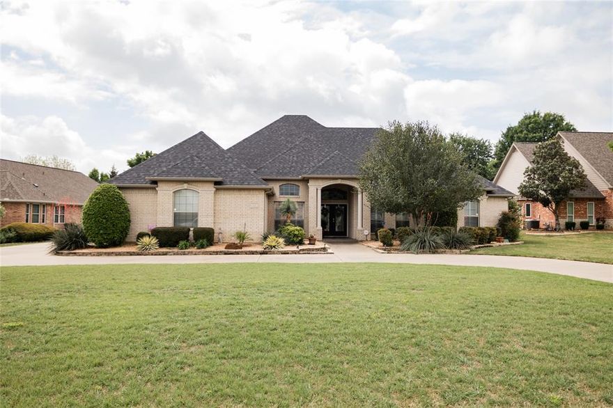 Beautiful Custom home, pet free child free, meticulous maintained.  Private and highly desirable Brookbend Grove area.  Truly custom home on over a half acre sitting on a cul de sac. Welcoming circle drive with muture low maintenance landscaping, tiled front porch with double front doors.  Home features plantation shutters, crown molding, ceiling fans throughout. Woods floors, transom windows and 12 foot ceilings in open concept living area.  Great room has custom built-ins and gas log fireplace with powder room conveniently located nearby.  Cooks kitchen features stainless steel appliances with double ovens, gas cooktop, custom cabinets, granite counters, island, large bar with walk in pantry. Opulent dining room with columns, transom windows, 12 ft ceiling.   Spacious breakfast nook with natural light. Large office with custom built-in desk and cabinets, French door.   Sunroom or flex room has tons of natural light, French doors overlooks pool.  Large primary bedroom with tray ceiling, ceiling fan, primary bath features dual vanities with beveled framed mirrors, jetted tub, separate shower,  private toilet room, large walk-in closet with built-ins.  Two large guest rooms with en-suite jack-n-Jill style bathroom, walk-in closet with built-ins in the front room, second bedroom has double closets. Both baths have beveled framed mirrors and plenty of storage.  Full size appliances set side by side in the laundry area with sink and cabinets. Double car garage with extra space for storage.   Backyard is a perfect entertainment area with a lovely pool, heated spa, large pergola, covered and tiled patio has speakers and wired for tv, bar area has a frig and storage area.  Mature landscaping and wrought iron fence.  Additional land behind pool area large enough for in-law suite or shop.  A must see property with nearby access  to I 35 and Hwy 287, located near historic Downtown Waxahachie and the north side expansion of shopping & restaurants.