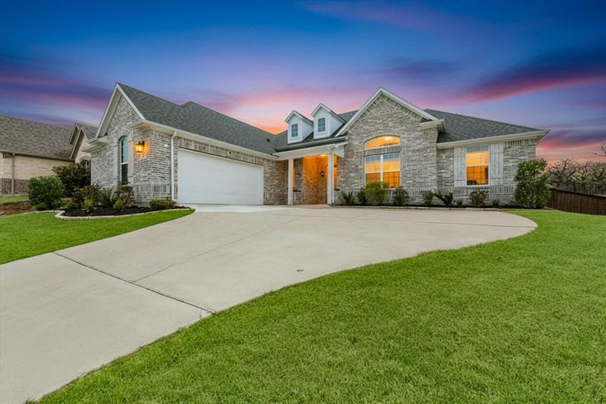 This beautiful Windmiller home offers comfort, functionality, and peaceful surroundings—backing to a ranch where Longhorn cattle graze, creating a truly unique and private backdrop. Inside, rich luxury vinyl plank floors welcome you and set the tone for the open, inviting layout. A wall of windows along the back fills the home with natural light and showcases serene backyard views. The spacious family room with soaring ceilings and a stunning gas fireplace with stacked stone—offers a cozy focal point and entertainer’s dream—flowing seamlessly into the kitchen. Designed with both luxury and practicality in mind, the kitchen boasts white cabinetry, quartz countertops, GE Profile appliances, and useful storage throughout. The Whirlpool side-by-side refrigerator can remain.  Filtered drinking water at the sink and expanded pantry space add everyday convenience. With a split-bedroom floorplan for privacy, the primary suite is tucked off the kitchen. Here the warm hardwood flooring continues. Electronic shades enhance the natural light and capture peaceful backyard views. The ensuite bath features a Jetta Advantage soaking tub, separate shower with bench, dual vanities, and a generous walk-in closet. A large study with French doors and closet provides the perfect space for a home office, guest room, or flex space. Secondary bedrooms are spacious, with one offering direct access to the hall bath via a pocket door—ideal for guests or multi-generational living. The laundry room is equipped with additional cabinetry and a folding area, and the GE Profile washer and dryer can remain with the home. Step outside to a backyard retreat that’s hard to find in a subdivision—private, peaceful, and designed for relaxation with a covered patio and pull-down sunscreens. Additional features include a 20’ x 25’ garage and an ONIT home filtration system. Conveniently located near Hidden Creek Golf Course, retail, restaurants, Russell Farm Art Center, HEB. Ask for full list of updates.