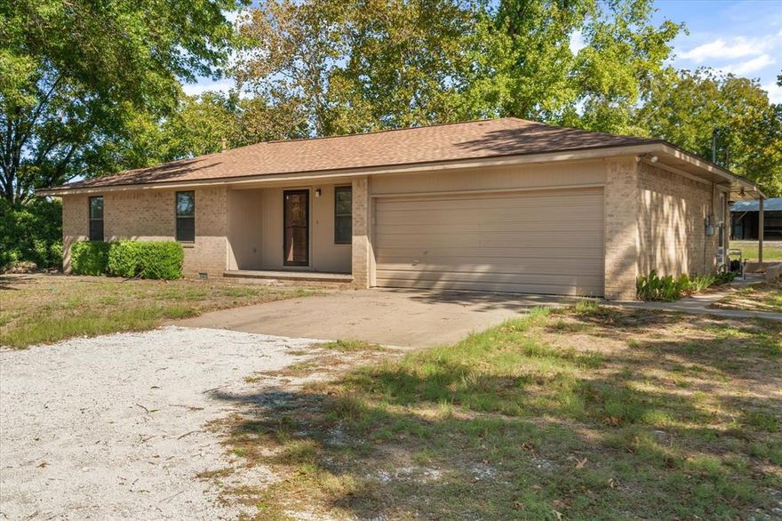 Family compound available for lease.  This listing is for the house to the left as you face them at 2711 Tin Top Road.  Featuring 3 Beds and 2 Baths this home is move ready with no water bill! Shops and additional living space available for additional consideration! Agents see private remarks for additional information. Additional info also seen in photos.