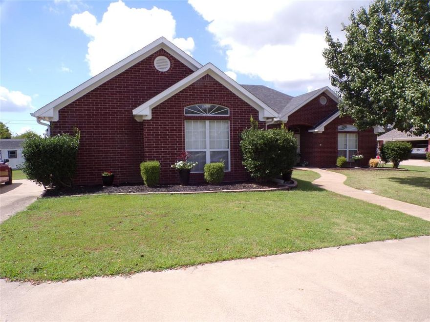 Charming 3-bedroom, 2-bath home on a ½ acre lot in Rose Hill! Features include a cozy fireplace, wood floors, updated owner’s suite shower, and a bonus room over the garage. Enjoy outdoor living with a pergola patio with lights, gazebo, and two sheds—one with electricity, perfect for an office or man cave.