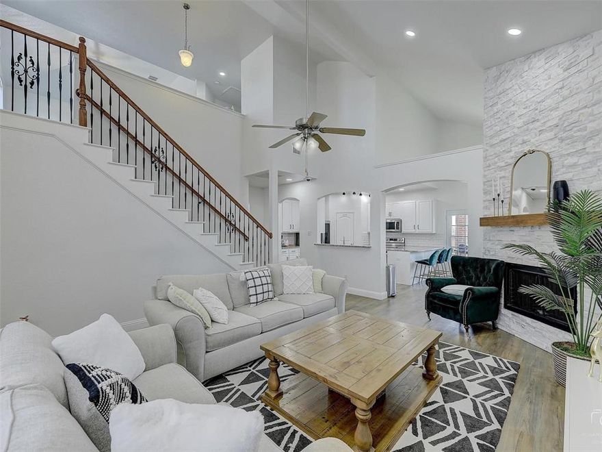 Experience the charm of a beautifully updated home that feels like new while offering the warmth of a pre-loved residence. This 3-bedroom, 2.5-bath home has been meticulously modernized with light-filled, open spaces and stylish upgrades throughout. Enjoy stainless steel LG appliances, premium laminate hardwood flooring, recessed lighting. A striking floor-to-ceiling white marble brick fireplace creates a perfect focal point in the living area, while the spacious layout includes two living spaces, split bedrooms for privacy, and a convenient powder room in addition to two full baths.
Located in a well-established and highly convenient neighborhood, the home is just minutes from the lake and highly rated schools, offering both comfort and convenience. This is a rare opportunity to move into a stylish, move-in ready home in a desirable Fort Worth community.