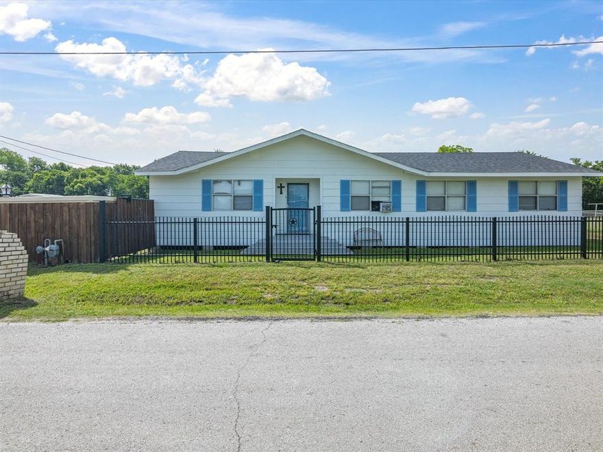 Come see the potential in this charming 3-bedroom, 1-bath home at 707 Washington St. in the heart of Ennis!  With a second bathroom already started and ready for your finishing touch, this home offers room to grow.  The open living area is perfect for family time or entertaining, and the kitchen features a large island with a sink and beautiful granite countertops.  Some updates have already been done, including stylish laminate flooring and a brand-new roof in 2025.  HVAC vents are already installed—just add the units to enjoy central heating and air. Window units are currently being used. This is a home with good bones and great possibilities!  This is a unique opportunity—whether you're looking for a starter home, investment property, or a place to customize and make your own, this one is worth a look. Come see how you can bring out the best in this inviting space!