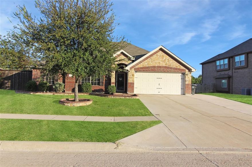 Welcome to this move-in-ready home in the highly desired Trinity Meadows community of Crandall, TX! This charming 3-bedroom, 2 bath home sits on a large .34-acre lot—currently the largest lot on the market in this subdivision—offering space and privacy rarely found in the neighborhood.  From the curb, you’ll love the front-facing 2-car garage paired with a triple-wide driveway, perfect for extra parking or hosting guests. Step inside to a beautiful living room featuring a wall of windows overlooking the oversized backyard. The ceramic tile flooring gives the warm look of hardwood with the benefit of easy cleanup, making it both stylish and practical.  The open-concept floor plan connects the living room to the eat-in kitchen and formal dining area. The dining room, located just off the entry, adds character with its faux-brick accent wall. The kitchen is a chef’s delight with granite countertops, white cabinetry, an island with sink and dishwasher, pantry, and stainless steel appliances—including a built-in microwave, stove, and dishwasher.  The split-bedroom layout provides privacy with two nicely sized secondary bedrooms and a full hall bath on one side of the home, while the spacious primary suite is tucked away on the other. The primary bedroom features two large windows for natural light, and the en-suite bathroom boasts dual sinks, a walk-in closet, a separate shower, and a jetted soaking tub for relaxing at the end of the day.  Additional highlights include a dedicated laundry room with shelving and room for full-size appliances. The fully fenced backyard is a true showstopper—perfect for entertaining, gardening, or simply enjoying the outdoors.  This stylish, well-maintained home is clean, updated, and truly move-in ready.  Take this opportunity to make this home yours!