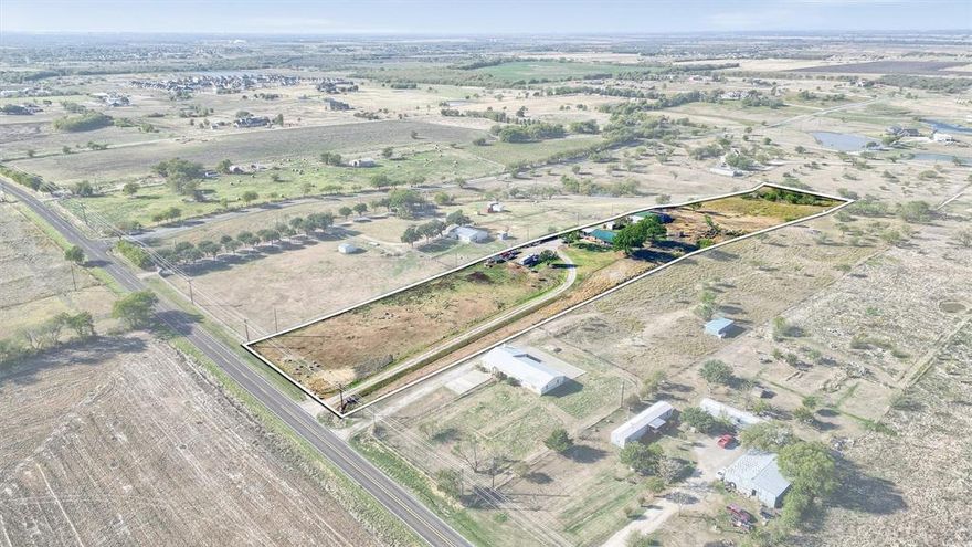 This promising 5+ acre investment property fronts on North Louisiana Street, just outside of Celina. It features a high elevation point, providing panoramic views of the surrounding countryside. The land is flood-free and designated for future Industrial Commerce use. While there is a residence on the property, it holds no value. Conveniently located on the edge of Downtown Celina, this property is currently outside the city limits. There is a possibility of more acreage available.