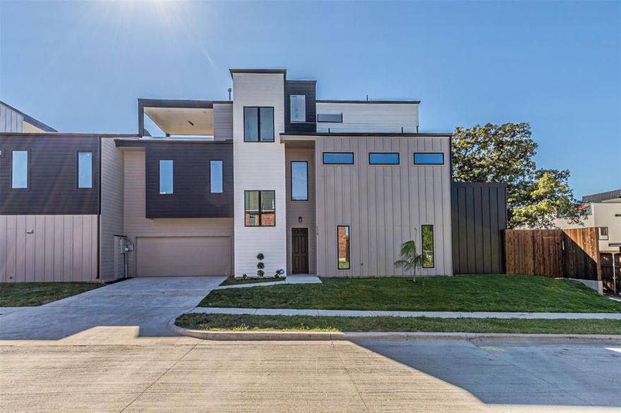 $50K PRICE REDUCTION!
An incredible opportunity to own this beautiful, move-in ready home at an exceptional value.
Experience modern luxury at its finest in this newly built 2026 duplex ideally situated between Uptown and the Medical District in the heart of Dallas. This sleek three-story residence blends transitional architecture with refined finishes, just minutes from Oak Lawn, Downtown, and the Design District.

The open-concept first floor features a chef’s gourmet kitchen with quartz countertops, custom cabinetry, a waterfall island, and stainless steel appliances. The spacious living room anchored by a large modern fireplace flows seamlessly into a private fenced backyard, perfect for relaxing or entertaining.

Upstairs, the primary suite boasts a private balcony with stunning city views, a spa-like bathroom with a freestanding tub and porcelain tile, and a generous walk-in closet. A second living space and two additional bedrooms, a hall bath, and laundry room complete the second floor. The third floor offers a large game room, half bath, and rooftop balcony with unmatched skyline views, an entertainer’s dream.

With proximity to Uptown, the Medical District, Old Parkland, the NTTA, I-35, and DART Market Station, this transitioning neighborhood promises exceptional growth and convenience. Discover the perfect balance of design, location, and lifestyle in this architectural gem.