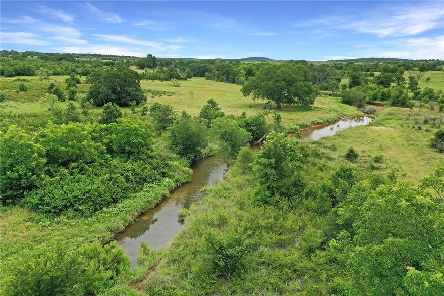 Stunning and rugged 215-acre ranch located in Northeast Jack County just west of Montague County. These 215 acres have it all. Lush hardwoods, significant elevations with views to the south and east, large neighbors to the east and south, excellent hunting, and more. The property has one stock tank. A large creek winds from northwest to southeast through the middle of the property. Ag Exempt. 

Access: The property is accessed from a 1.1-mile easement from E. Truce Road. The easement dead ends into the property. No access easement through the 215-acre tract.

Oil & Gas: There is production on the property. Two active pumps on the east side. One pump jack on the west side.

Shown by appointment only.