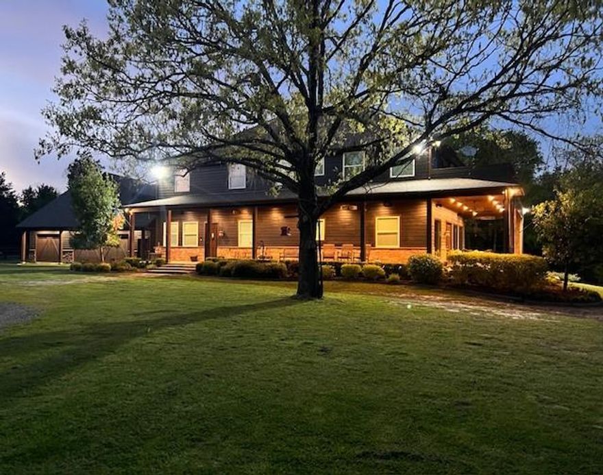 Discover this stunning 78-acre estate, a perfect blend of luxury living, privacy, and recreational opportunity. The centerpiece of the property is a sprawling 4,056 sq. ft. custom-built main home currently configured as a 4-bedroom, 5-bath residence. The main floor is designed for entertaining, featuring a large open floorplan with two living areas, a formal dining room, a spacious kitchen with a large pantry utility room, and a versatile office that could serve as an additional bedroom.

Upstairs, enjoy a second living room complete with a bar, pool table, and large porch, plus two bathrooms, an additional bedroom, and an expansive master suite with luxurious bath. Complementing the main home is a detached garage with ample storage and workspace, including a beautifully finished 1,062 sq. ft. upstairs apartment offering an open-concept living, dining, and kitchen area with one bedroom and one bath.

The property is accessed via a private gated entrance and a gravel drive, leading past a stocked pond with a decorative fountain. On the opposite side of the home, a fenced pasture is ideal for horses or cattle, while the remaining acreage is perfect for hunting and recreation. A large duck slough planted in millet enhances waterfowl opportunities, and the varied terrain of wooded and open areas supports abundant wildlife including whitetail deer, hogs, and small game. This estate seamlessly combines comfort, functionality, and outdoor adventure.

4,056 sq. ft. custom main home: 4 BR  5 BA with main floor entertaining layout
Main floor: 2 living rooms, dining room, kitchen with large pantry utility, office
Upstairs: secondary living room with bar & pool table, large porch, master suite with bath, additional bedroom and 2 baths
Detached garage with finished 1,062 sq. ft. apartment: 1 BR  1 BA, open living, dining, kitchen
Stocked pond with fountain
Large duck slough planted in millet
Abundant wildlife: whitetail deer, hogs, small game