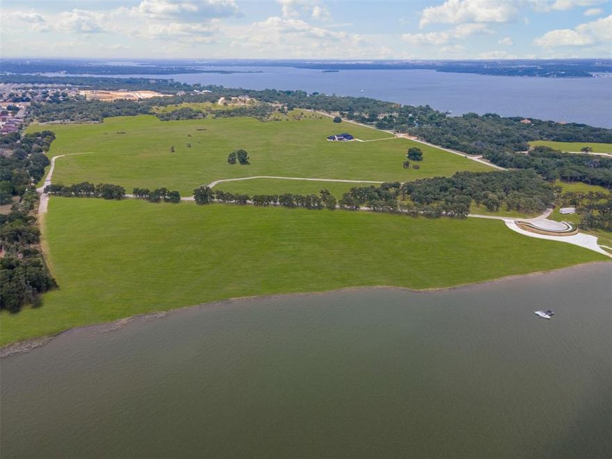 Discover Lot 4 at Waterfront on Park — a rare 1.50-acre homesite in an exclusive community on the tranquil, south-facing shores of Eagle Mountain Lake. Once a beloved city park, this private enclave now features just 16 premium lots with direct lake access for swimming, boating, and fishing, and breathtaking water views. Enjoy the serenity of lakeside living just minutes from vibrant downtown Fort Worth. This is your opportunity to create a custom retreat in a setting where nature, privacy, and convenience converge.