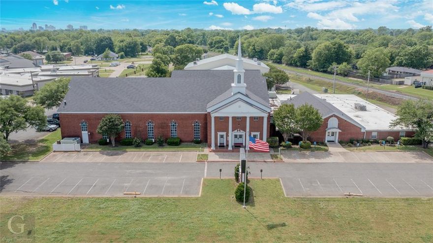5.60 acre tract of commercial land and 67,000 HSF Church facility consisting of 3 separate buildings. PLUS a .85 acre vacant commercial use tract.
Square footage for buildings: 1.5 story Church facility with education space, built in 1975- 39,221 HSF. 
1.5 story gym with offices built in 2002- 23,800 HSF. 1 story maintenance building with HVAC- built in 1995 - 4,000 HSF