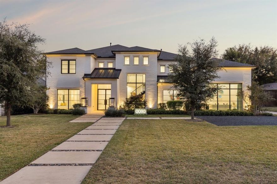 Located in the heart of the prestigious Preston Hollow neighborhood, this custom home, completed in 2021 by acclaimed builder James Canterbury, exemplifies modern design and luxurious functionality. The grand entry with a floating glass staircase introduces striking architectural detail and natural light throughout. The open-concept main level is ideal for entertaining, featuring a full wet bar, designer lighting, and a bonus media room. The chef’s kitchen impresses with a Wolf double-oven range, oversized Sub-Zero refrigerator, and a stunning waterfall island perfect for gatherings and gourmet prep. Upstairs, a spacious game room and three ensuite bedrooms offer privacy, comfort, and generous built-in storage. Since completion, the owners have added numerous luxury upgrades, including an AquaSure water purifier, custom window shades and drapery, built-in cabinetry, beautifully book matched stone on the fireplace, and upgraded chandeliers. Outdoor enhancements elevate both style and functionality, full turf installation with a golf putting area, security cameras and motion lighting, illuminated address signage, added parking with concrete pads, and an EV charging port. The private backyard oasis features a sparkling pool and integrated spa, an inviting outdoor living area with fireplace and kitchen, and sleek concrete pads surrounded by lush turf—perfect for both entertaining and relaxation. This exceptional residence offers effortless access to premier shopping, dining, and major highways, embodying the best of Dallas luxury living.