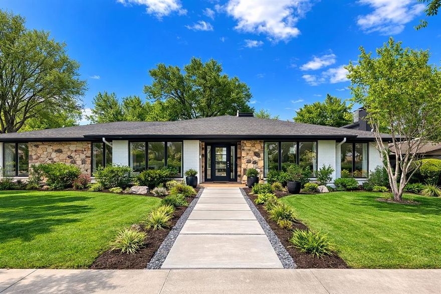 Completely reimagined and taken down to the studs, 7117 Mimosa Lane offers the rare opportunity to own what is essentially a brand-new home within a classic footprint. Rebuilt with a modern, open-concept floor plan, the home features expanded living spaces that seamlessly connect the kitchen, family, and great room—ideal for both everyday living and entertaining. All major systems have been replaced, including new plumbing (cast iron removed and replaced with PVC), HVAC, electrical wiring, insulation, and double-pane Argon windows. Mechanical systems have been thoughtfully redesigned for efficiency, including a new HVAC layout and a modern electrical panel with GFCI breakers and CAT6 wiring throughout.
Interior finishes showcase exceptional craftsmanship, including Level 5 smooth-finish walls, all-new flooring with reinforced subflooring, custom cabinetry and millwork, and an expanded fireplace feature that anchors the main living space. The kitchen is fully updated with new appliances, including a gas range. The primary suite offers a private retreat with custom finishes, a skylight, and enhanced sound insulation. Thoughtful details such as automatic closet lighting add everyday convenience. Outdoor living shines with professionally designed landscaping featuring native Texas perennials, zoysia grass, and app-controlled irrigation systems for front and back yards. The backyard is enclosed by an 8-foot fence with a rolling gate and highlighted by canopy lighting in a mature oak tree. A standout indoor-outdoor living space includes a remote-controlled sunshade, heaters, fan, lighting, TV, and multiple outlets—perfect for year-round enjoyment. Engineer-verified foundation and roof inspection reports available. Truly turnkey with no detail overlooked.