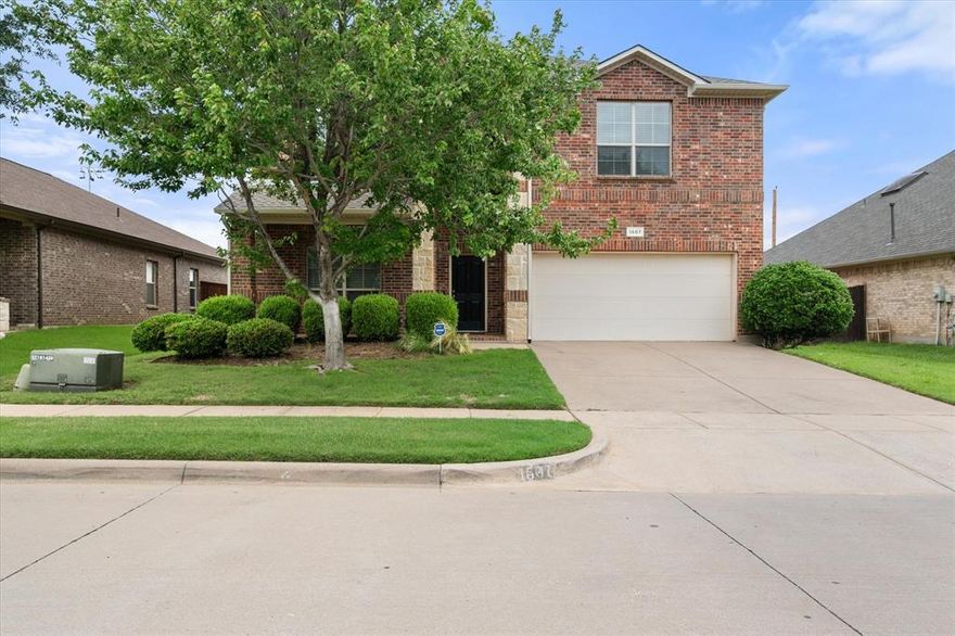 This beautifully designed 5-bedroom, 3-bath home offers one of the most functional and desirable floorplans available! The main level features a spacious primary suite along with a secondary bedroom and full bath—perfect for guests or multi-generational living. Both downstairs bedrooms showcase brand-new carpet.  The chef-inspired kitchen boasts granite countertops, a center island, 42-inch cabinetry, gas stove, and abundant storage, all opening seamlessly to an oversized dining area and inviting Great Room with a gas fireplace. The home is ideal for entertaining and everyday living. A versatile front room offers flex space which can easily serve as a formal dining room, library, or sitting area. Upstairs, you’ll find three generously sized bedrooms, a full bath, and a large game room offering additional living space.  Enjoy your covered patio with added privacy in the backyard with no rear neighbors. Located in the highly sought-after **award-winning Mansfield ISD**, this home truly has it all! Fresh paint downstairs and Roof replaced in 2025. Need help with closing costs? This home qualifies for a Community Investment Grant. Call me for more details.