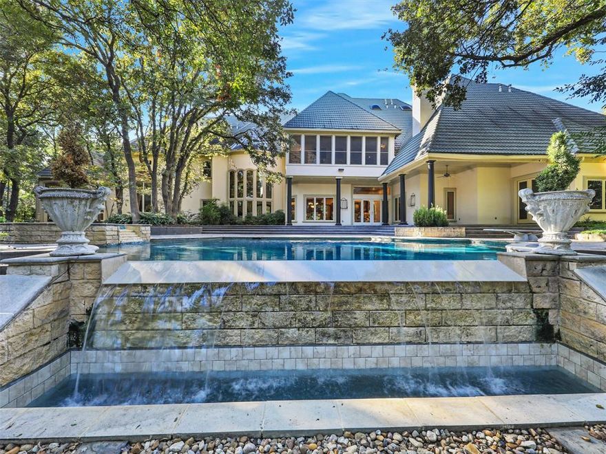 Welcome Home to this Exquisite Estate quietly nestled on a 1.7 acre treed lot in prestigious Wyck Hill - Westlake. Rare opportunity to also purchase the vacant, treed 1.4 acre lot to the Left side to create a 3+ acre Estate of your Dreams!!!!  Enter the private driveway gate and meander the tree-filled path toward the grand front entry. Timeless elegance abounds as you enter the Formal Entry, Living and Dining with highest-end luxury craftsmanship, soaring ceilings and wall of windows. The Family area boasts a large Kitchen, Breakfast area and Keeping Room overlooking the pool, plus a spacious Family room with Bar and fireplace. The stately Study boasts a roaring fireplace, 2 story catwalk library and back office with storage. Escape to the private, elegant Master retreat to your quiet paradise with huge spa Bath, grand Master closet and pool views. There are enough Bedrooms and entertaining rooms for the entire family to enjoy, including a Theatre Room, Exercise Room, Full secluded Guest-Nanny apartment with private entrance and a full Pool house. Beautiful tree-filled grounds features a sparkling pool, lush landscaping, walking path, fountain and more!

Pool-guest house is 678 Square feet and has a living room with Murphy bed, kitchenette and full bath (not included in square footage).