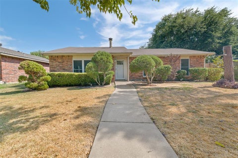 Photo of 1418 Paris Drive, Garland, TX 75040 (MLS # 21393353)