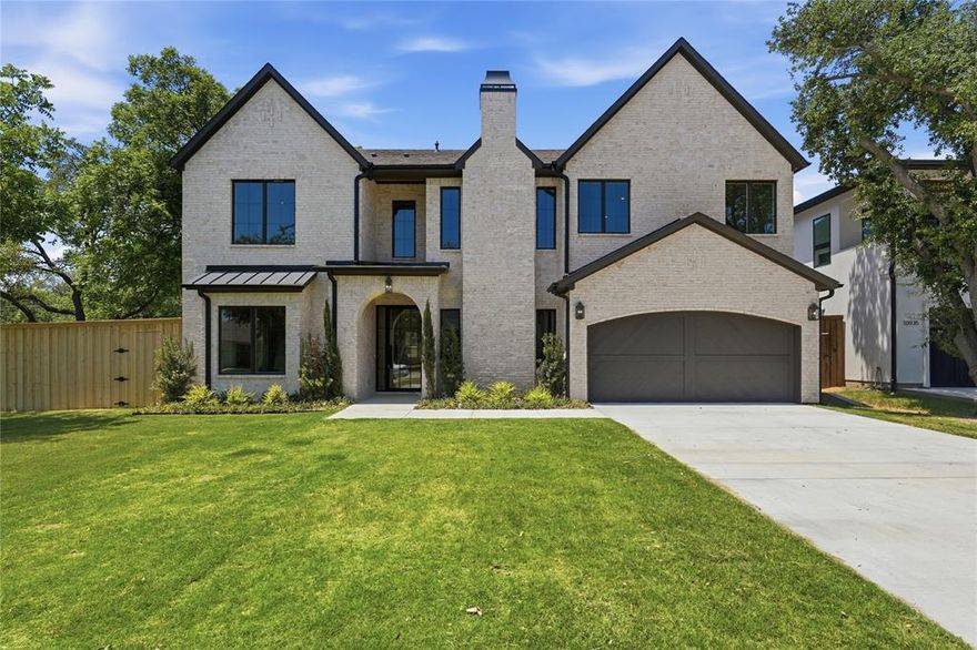 Completed by Maison Manor Homes, 10921 Beauty Lane is a striking new construction residence that blends timeless architecture with warm, modern interiors in one of Dallas’ most desirable neighborhoods. Designed with both scale and livability in mind, the home features soaring ceilings, wide-plank hardwood floors, curated designer finishes, and an effortless indoor-outdoor flow throughout.
The light-filled living room is anchored by a dramatic floor-to-ceiling stone fireplace and oversized sliding doors overlooking the backyard, while the chef’s kitchen offers custom white oak cabinetry, an oversized waterfall island, premium appliances, and a seamless connection to the dining and living spaces—ideal for both everyday living and entertaining.
A moody, design-forward study with fireplace creates the perfect work-from-home retreat, while the thoughtfully designed floor plan offers spacious bedrooms, spa-inspired baths, and elevated details at every turn. From the soft natural palette to the layered textures and architectural lighting, every space was intentionally designed to feel refined yet comfortable.
Situated on a beautiful tree-lined street, 10921 Beauty Lane delivers the craftsmanship, scale, and timeless aesthetic Maison Manor Homes is known for, just moments from top private schools, premier shopping, dining, and everything Dallas has to offer.