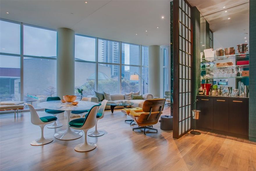 Stunning two Bed two bath apartment in the luxurious renowned Museum Tower. Private direct elevator access to this unique upgraded home that  comes with the benefit of 12 ft ceilings. Marble wall with fireplace and TV and electric blinds throughout. Gourmet kitchen with gas cooktop and Miele and Subzero appliances. Over sized Laundry room with storage and full size washer and dryer. Dry bar with ice machine. Main bedroom have custom walk in closet and ensuite spa bathroom. Both bedrooms have custom electric drapes. Covered terrace with tree top and city views. Enjoy the wonderful amenities that Museum Tower offers, plus two assigned parking spaces and a storage  make this apartment a must see.