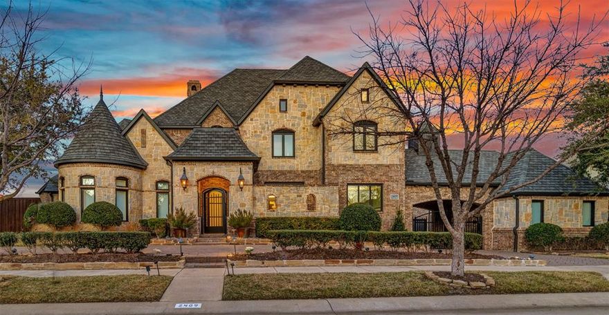 This stunning golf course home in the guard-gated Enchanted Hills community has been extensively redesigned to a luxurious retreat that will take your breath away. Every room features custom designs and must-have features, creating a soft contemporary look that will also blend seamlessly with traditional styles. Highlights include the gourmet kitchen with custom white oak cabinetry, JVC appliances (6 burner gas range with double ovens, built-in fridge), built-in coffee bar with Miele coffee-cappucino maker, and wine fridge). It leads to the open concept dining area and living room with a fireplace and access to a large covered balcony overlooking the pool, lake and golf course. The primary suite is truly riveting with a separate niche boasting a gas log fireplace, private access to the balcony plus updated bath. The primary closet was expanded by closing off the study from the foyer and re-imagined into 3 areas with granite wine bar and fridge, built-in vanity with lit mirror, floor-to-ceiling custom wood cabinetry, and a private sitting area! Entertain in style in the redesigned basement with separate areas for media and game rooms, including a custom wet bar featuring custom cabinets and KitchenAid appliances. A guest bedroom and full bath complete the basement. The second floor offers a renovated game room and four more bedrooms, two with private baths and one with 19x16 room accessed through the closet! A resort-style oasis awaits you in the backyard the sparkling diving pool and spa with waterfall and bubbling stream with plenty of grassy area for kids and pets! The patio off the game room provides a fireplace, outdoor kitchen with built-in grill and fridge, plus multiple seating areas.  A spiral staircase connects the patio and the balcony. Fabulous location close to 121, DNT, Grandscape and quick drive to DFW airport.