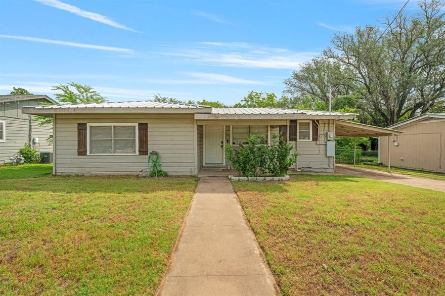 Buyers Financing Fell Through and is Back on the Market! Charming 3 bedroom, 2 full bath home with a spacious backyard! This adorable frame home is full of potential - whether you're looking for a great investment property, or a cozy place to call home. Step inside to find a warm and welcoming layout with generously sized bedrooms and two full bathrooms. Outside, enjoy a large fenced backyard that's perfect for pets, play, or outdoor gatherings. A back deck provides a space to relax or entertain and also has a covered front porch. There is a carport for convenient parking. Affordable, functional, and a great opportunity! It's move in ready for tenants immediately or start living in it right away!