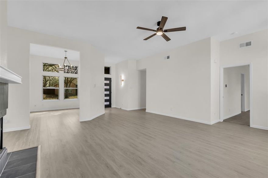 COMPLETELY RENOVATED & READY FOR QUICK MOVE IN! AMAZING LIST OF UPDATES, over $100,000 spent just in the past few months include Luxury Vinyl Plank in all living areas, beautiful front door! New cabinets in both baths & kitchen with corner deep reach lazy susan & pull out trash drawer! Light & bright kitchen, quartz countertops, single basin 11 inch deep sink, stainless appliances, 4 door Samsung French refrigerator just installed! More amazing features include decorator lights, fresh hardware, smooth ceilings, ceiling fans, switches, fresh paint in and out! Hi efficient tilt out vinyl windows, back door (blinds sealed in glass)! Great open floor plan, long box out window in breakfast room, 2nd pantry & vaulted to 11 ft in primary bedroom overlooking private large backyard! Since October 2025: Carrier HVAC, metal stairs to attic, roof & new fence! Great location close to 121 & 75 for quick easy access any direction! Great choices of restaurants & shopping nearby including the new Costco.