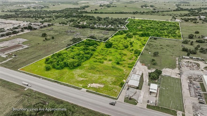 Premier development opportunity with one of the highest Texas Department of Transportation traffic counts in Stephenville city limits! Beautiful 26 plus acre piece with ample Washington St. (Highway 377) frontage and utilities on site. This high visibility location is easily accessible, ideal for significant commercial development. The property is currently zoned B-2, allowing for high profile businesses such as retail, restaurants, hotels, banks, churches, and much more. The back of the property would make for an excellent residential development if rezoned. Seller financing is available, and terms are available upon request.