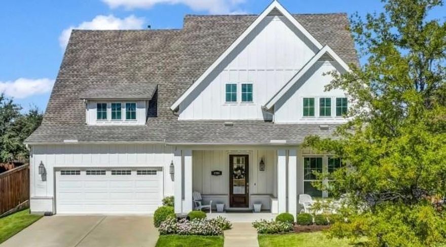 This modern farmhouse is a true gem, designed for comfort, connection, and everyday luxury. Step inside and you’ll find an inviting open layout featuring porcelain tile floors, a welcoming family room with gas fireplace, and a gourmet kitchen that makes entertaining a joy. The oversized walk-in pantry—nearly 14 feet long—is a dream for any home chef, while the spacious breakfast nook opens to a pair of custom barn doors leading to a beautifully designed his-and-her office. The primary suite offers a spa-inspired bath with jetted tub, walk-in shower, and two generous closets. A private guest suite and full bath on the main level provide comfort for visitors, and upstairs, the media room and flexible spaces offer room for everyone to gather or unwind. Step outside to an extended covered patio with outdoor kitchen—perfect for evening meals or quiet mornings under the Texas sky. Even the laundry and garage spaces were thoughtfully designed with custom cabinetry and plenty of storage. Located in the award-winning Walsh Ranch community, residents enjoy resort-style pools, a 10,000-sq-ft fitness center, parks, trails, a neighborhood market, and Aledo ISD schools. Every detail in this home reflects quality, care, and the joy of living well.