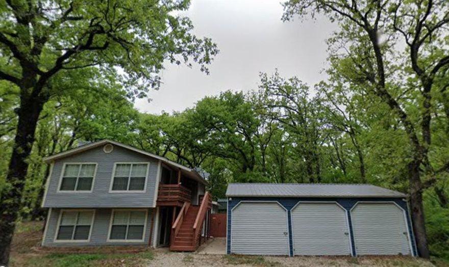 Welcome to your dream retreat near the shores of Cedar Creek Lake—where comfort, space, and lake living come together beautifully. This stunning 3-bedroom, 2-bath home offers the perfect blend of everyday functionality and relaxing getaway vibes. A spacious 3-car garage provides ample room for vehicles, lake toys, and storage, while the thoughtfully designed floor plan creates an inviting flow throughout the home. The oversized primary suite is a true sanctuary, featuring a private sitting area—ideal for a reading nook, office space, or quiet retreat—and direct access to a private balcony where you can enjoy peaceful mornings and evening sunsets. Cozy up by the wood-burning fireplace in the main living area, creating the perfect ambiance for gatherings with family and friends. Step outside to your own private oasis. The backyard is fully enclosed with a privacy fence and designed for entertaining, highlighted by a large covered cabana—perfect for outdoor dining, relaxing in the shade, or hosting weekend get-togethers after a day on the water. Adding even more charm and functionality is a cute 12x20 storage building, ideal for tools, hobbies, lawn equipment, or extra lake gear. Located in a desirable lake community, residents enjoy exclusive access to a private boat ramp, dock, and playground—making it easy to embrace the lake lifestyle year-round. Whether you're looking for a full-time residence or a weekend escape, this Cedar Creek Lake beauty offers space, privacy, and the ultimate in lakeside living.