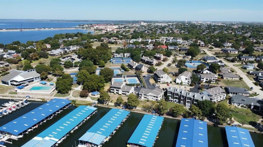 Discover an incredible opportunity to build your custom dream home in the highly sought-after waterfront community of Chandler’s Landing in Rockwall. This prestigious gated neighborhood on the shores of Lake Ray Hubbard offers a resort-style living experience with 24-hour security, two community pools, tennis courts, a private marina and boat ramp, lakefront dining, stocked fishing ponds, and scenic walking, biking, and jogging trails. Residents also enjoy a vibrant calendar of community events throughout the year. Custom home plans are included with the sale, making it even easier to bring your vision to life. Ideally located just minutes from shopping, dining, and entertainment, this property offers the perfect balance of peaceful lake living and everyday convenience.