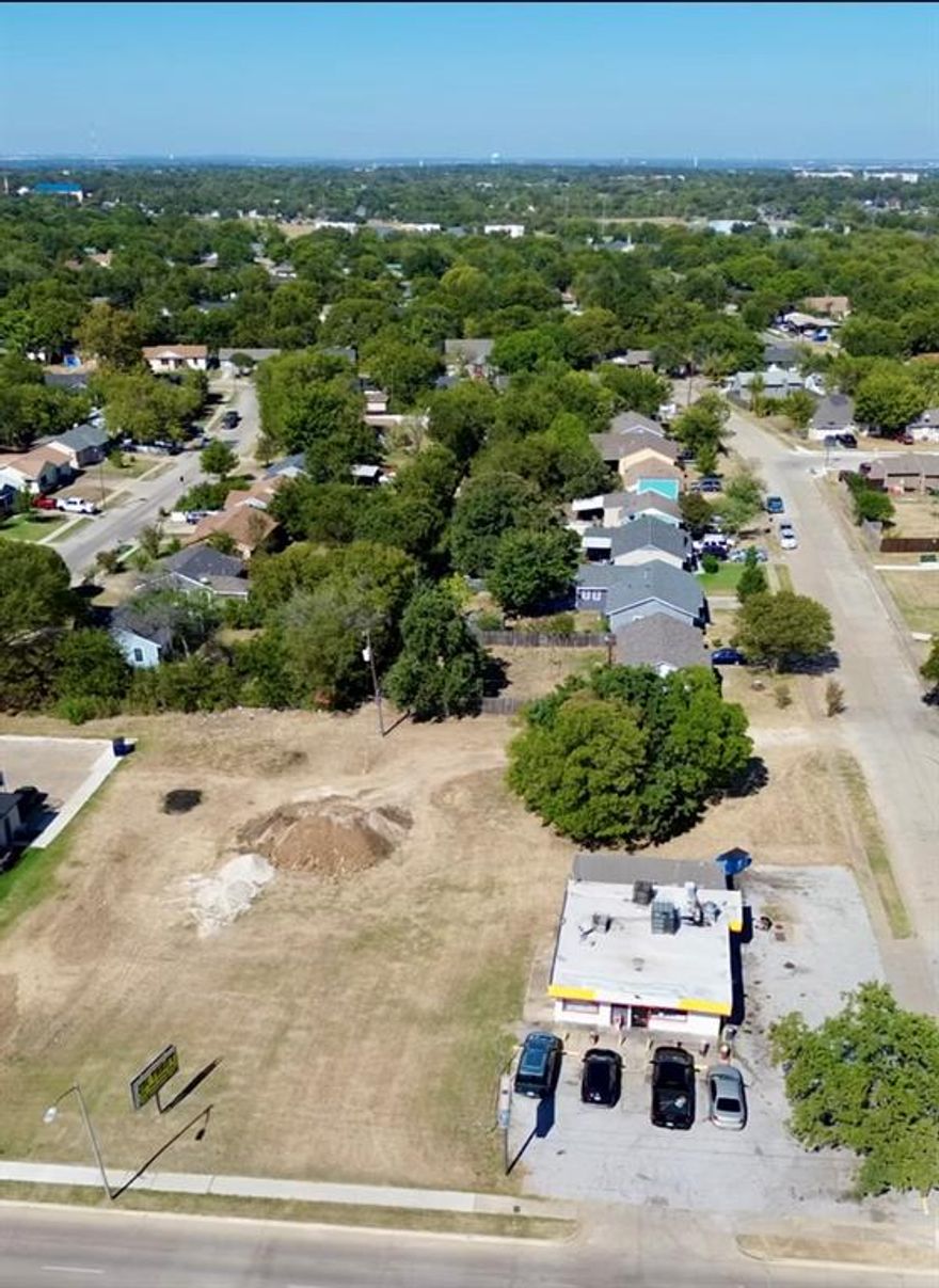 Two lots sold as one. 3104 S Hughes Ave EASTWOOD ADDITION BLOCK 9 LOT 14R1 included in sale. Both empty commercial zoned lots. Zoned E. Quick and easy access to HWY 287.