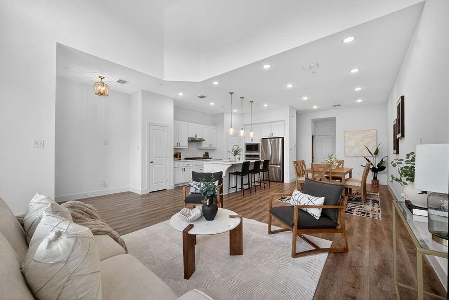 STUNNING LIKE-NEW HIGHLAND HOMES TOWNHOME in Trinity Falls! This impeccably maintained 3-bedroom, 2.5-bath home offers modern sophistication and the ease of a low-maintenance lifestyle. Built in 2022, this property feels brand new and features a bright, open-concept floor plan with soaring vaulted ceilings and premium wood-look flooring.

The chef-inspired kitchen is a standout, featuring natural stone countertops, a large breakfast bar, and a walk-in pantry. Upstairs, the spacious primary suite serves as a true retreat with a private nook—perfect for a home office—and a spa-like ensuite with dual sinks and a garden tub. Enjoy your morning coffee on the charming private front patio or take advantage of the resort-style community amenities, including a sparkling pool, dog park, and miles of hiking trails.

Perfectly located with quick access to Hwy 75 and US 380, you’re just 10 minutes from the shopping and dining of Historic Downtown McKinney.