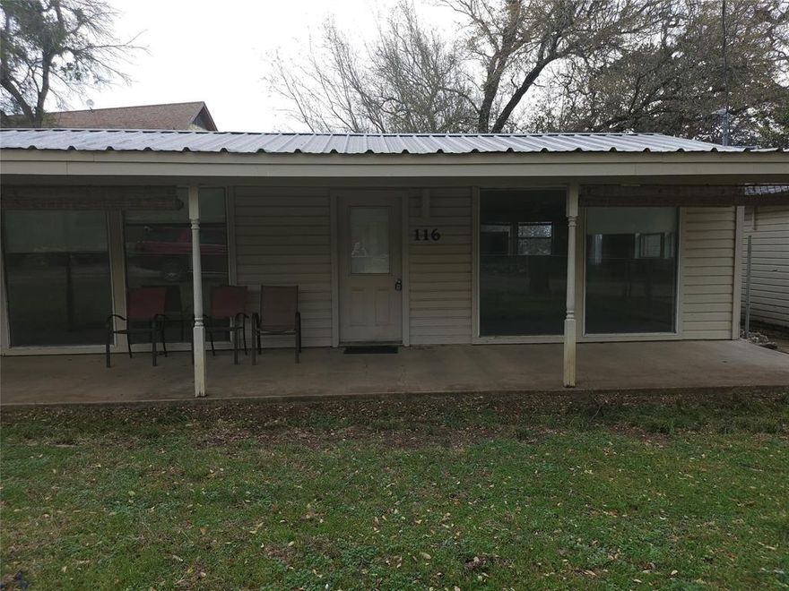 Escape to lake life with this 2 bedroom, 1 bath home near Lake Whitney!  The property includes two garages, perfect for boat storage, hobbies, or extra parking.  With its convenient location close to the lake, this home would make a great weekend retreat, investment property, or full time residence.  Enjoy peaceful surroundings while still being just minutes from fishing, boating, and outdoor recreation