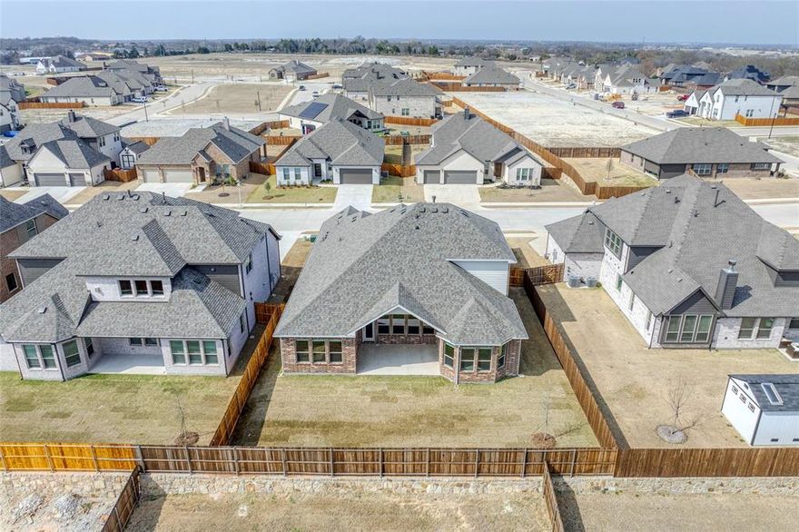 Welcome to your dream home near the serene Herman Baker Park! This stunning 4-bedroom, 4-bath residence offers an inviting open floor plan designed for modern living and effortless entertaining. The spacious living area features a cozy fireplace, perfect for relaxing evenings. The gourmet kitchen flows seamlessly into the dining and family spaces, creating a bright and airy atmosphere. Upstairs, a large game room provides the ideal spot for fun and leisure. Each bedroom is generously sized, offering comfort and privacy, while the bathrooms showcase elegant finishes. The two-car garage adds convenience and ample storage. Step outside to enjoy the peaceful surroundings and proximity to walking trails, scenic views, and all the natural beauty of Herman Baker Park. Combining comfort, style, and location, this exceptional home is ready to welcome you!