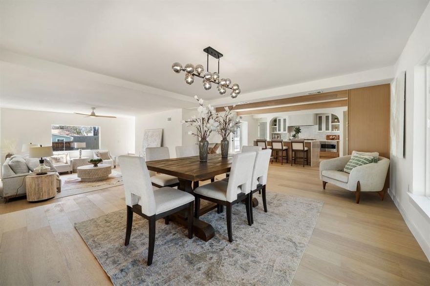 Fully renovated and move-in ready, this stunning home offers luxury living with major system upgrades, including two brand new HVAC systems, new ducting and complete cast iron plumbing replacement for long-term peace of mind. Step inside to wide-plank European white oak engineered hardwood flooring and a thoughtfully designed open layout. The custom designer kitchen is the true centerpiece, featuring white oak cabinetry, a marble backsplash, a professional-grade 48” range, and a farmhouse sink. Natural soft quartzite countertops anchor a statement oversized island, creating a sophisticated and highly functional focal point perfect for both daily living and entertaining. The primary suite is nothing short of breathtaking, showcasing a spa-inspired bathroom with an oversized walk-in shower, soaking tub, and a custom walk-in closet finished with marble and granite checkerboard flooring. 
Upstairs, you’ll find a private office along with an oversized patio deck—ideal for hosting or relaxing. The outdoor living continues with a large backyard deck complete with a custom grill, sink, and refrigerator, all set beneath a pergola designed for year-round entertaining. The backyard is further enhanced by a fully replastered pool with new coping and tile, creating a true resort-style experience. Cedar accents throughout the home add warmth, texture, and a distinctive high-end finish that makes this property stand out. This home blends designer finishes, functional upgrades, and exceptional indoor-outdoor living—perfect for entertaining and everyday comfort.