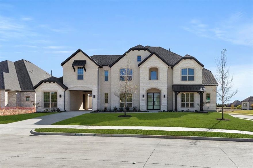 MLS# 20932825 - Built by Windsor Homes - Ready Now! ~ This stunning single-family residence, set for completion by October 2025, boasts 5 bedrooms and 5 full bathrooms and a powder across a spacious 4,741 square feet. Nestled in the desirable Winding Creek subdivision within the Rockwall ISD.  This home features an open floorplan enhanced by a two-story family room. Enjoy culinary delights in the eat-in kitchen equipped with quartz counters, a kitchen island, and a butler's pantry.  The property offers a study, gameroom, and media areas, perfect for entertaining. A elegant tiled two story gas fireplace adds sophistication to the family room. The exterior features a covered patio, exterior fireplace, and full sprinkler system. Additional highlights include drive-through Porte Cochere 3-car garage, and smart home system. Situated on a corner lot, this home is designed for modern living with thoughtful details throughout.