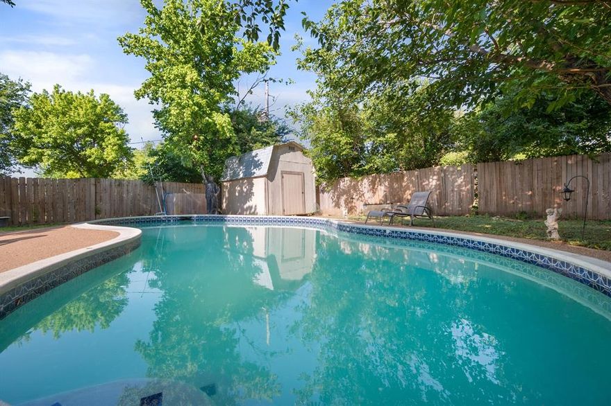 This updated home in the Wedgewood Addition is conveniently located near shopping, dining, and walking distance to elementary school. The layout is ideal for families, guests, or multi-generational living, featuring two master suites, spacious secondary bedrooms, and two living areas. The modern kitchen with granite countertops and updated cabinetry flows into the dining and living areas. The enclosed patio provides a flexible second living space and overlooks the backyard and sparkling in-ground pool. Perfect for entertaining, relaxing, or enjoying warm Texas evenings. Foundation recently repaired with transferable warranty.