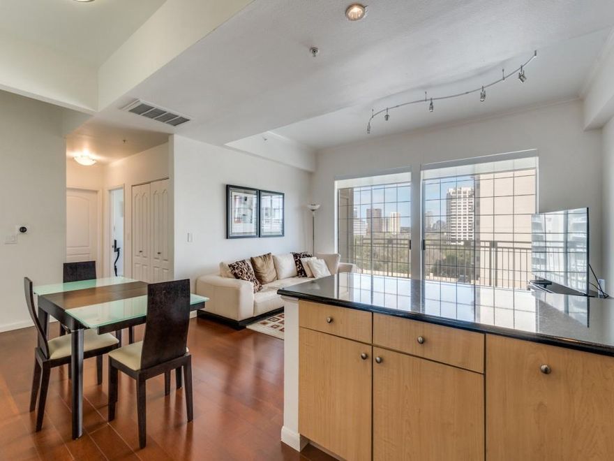 Welcome to a highly coveted Corner Unit at The Renaissance on Turtle Creek — one of the building’s larger floorplans and beautifully positioned to capture views of Turtle Creek Park, the pool deck, and the Downtown Dallas skyline. 
Wood Floors flow throughout the beautifully updated unit. The kitchen features granite countertops, stainless steel appliances, and Koviet water filtration system. 
Wake up to Downtown skyline views from the spacious primary suite, complete with an oversized walk-in closet. The primary bath offers designer updates and separate vanities. The guest suite includes its own walk-in closet and walk-in shower.
Enjoy indoor-outdoor living on the generous private balcony. Recent updates include the AC and water heater. Refrigerator, washer, and dryer convey, making this an effortless lock-and-leave lifestyle. Resort-style amenities include two pools, 24-hour concierge with valet, fitness centers, business centers, and guest suites. Unmatched access to Katy Trail, West Village, Uptown, Downtown, Oak Lawn, and the Arts District completes the experience.