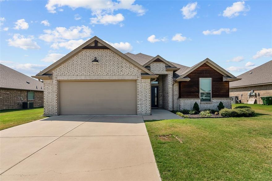 Step into comfort, style, and easy living in this beautifully maintained home located in the heart of highly desirable Godley ISD. Designed with both functionality and modern charm in mind, this property offers an inviting open-concept layout perfect for everyday living and entertaining.
The spacious living room features vaulted ceilings, abundant natural light, and a cozy brick fireplace that creates the perfect gathering space. The open kitchen is a true highlight, complete with granite countertops, custom cabinetry, stainless appliances, a large center island, and ample prep space — ideal for hosting family and friends.
The private primary suite offers a relaxing retreat with dual vanities, generous storage, and a walk-in closet. Secondary bedrooms provide flexibility for guests, home office space, or hobbies.
Enjoy Texas evenings on the covered back patio overlooking the backyard — perfect for morning coffee, grilling, or relaxing outdoors.