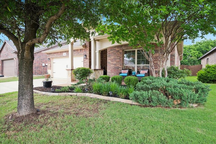 Nestled in the serene back of the Rolling Meadows neighborhood, this immaculate 1,918-square-foot single-story residence offers the perfect balance of peaceful seclusion and prime Keller convenience. Ideally located for an easy commute to the Alliance Corridor or a quick trip to downtown Keller, this home welcomes you with a quiet, private study off the foyer—perfect for the remote professional—followed by two secondary bedrooms. The heart of the home features a light-filled open concept where a chef-ready island kitchen flows effortlessly into a grand living room anchored by a cozy fireplace. Retreat to the primary suite, which boasts views of the backyard and an ensuite complete with a soaking tub, separate shower, and a generous walk-in closet. Outside, the level backyard serves as a  private oasis, bordered by  trees that ensure ultimate tranquility. Residents also enjoy premium community amenities, including a sparkling pool and playground, all within a premier Keller location.