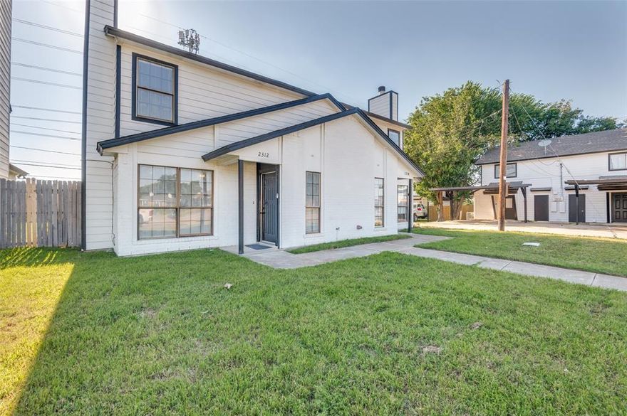 Beautifully updated attached home in Arlington offering a clean modern finish, functional layout, and private fenced outdoor space. This move-in-ready property features a bright living area with fresh neutral paint, updated flooring, recessed lighting, ceiling fan, and a painted brick fireplace that adds warmth and character to the main living space. The updated kitchen includes white cabinetry, quartz-style countertops, stainless steel appliances, modern black hardware, subway-style backsplash, and a clean contemporary design that opens naturally into the dining area. The downstairs layout also includes a convenient half bath and laundry area.
Upstairs, the home offers two well-sized bedrooms, including a primary suite with an updated ensuite bath featuring a dual-sink vanity, modern fixtures, and stylish tilework. Additional bathroom updates continue the same fresh, cohesive design. Outside, enjoy a private fenced backyard with room for pets, play, or outdoor relaxation, plus rear parking access. Conveniently located near shopping, dining, schools, parks, and major Arlington commuter routes. A strong option for buyers seeking an updated, low-maintenance home with no wasted space and modern appeal.
Buyer and buyer’s agent to verify all information including schools, square footage, room dimensions, taxes, HOA, restrictions, and property details.